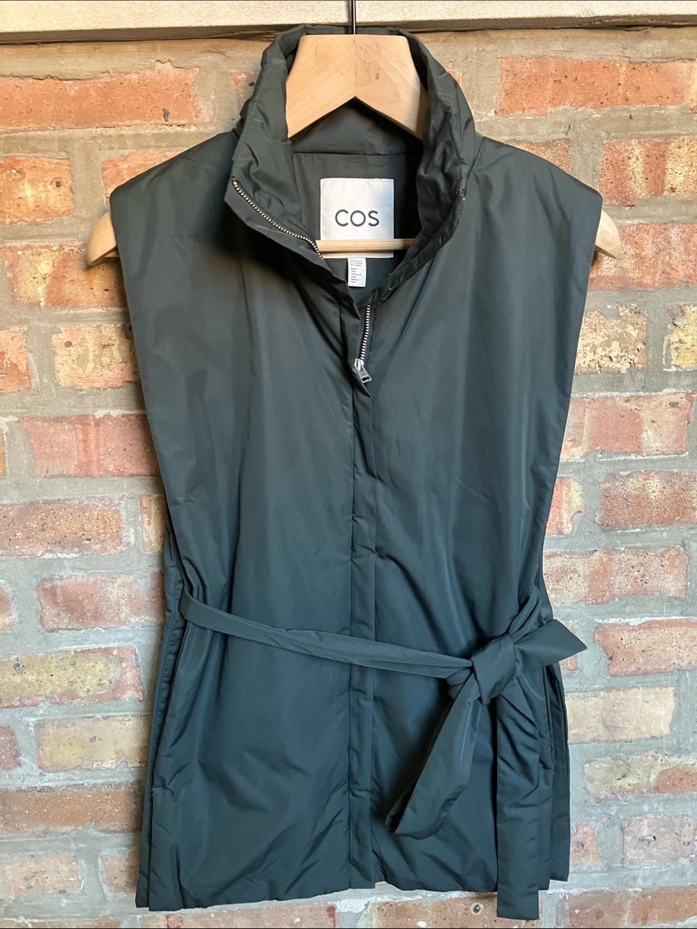 dark green COS high-neck padded vest